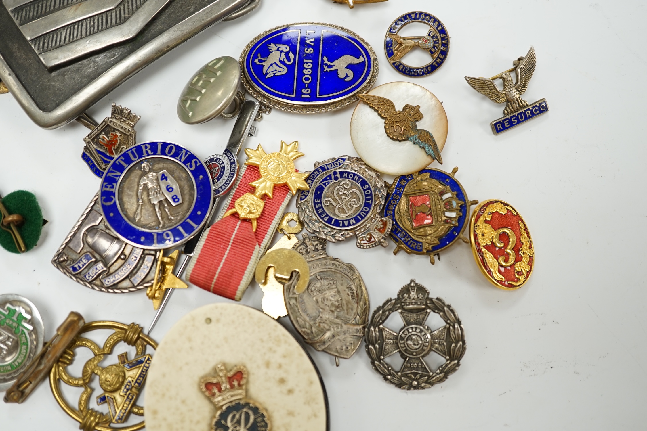 A collection of WWII sweetheart badges, silver badges, military buttons, RAF ephemera, a miniature OBE award, etc. Condition - fair to good